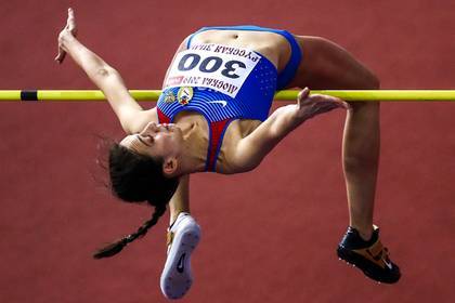 Мария Ласицкене - Ярослав Магучие - Ласицкене стала первой в истории трехкратной чемпионкой мира в прыжках в высоту - lenta.ru