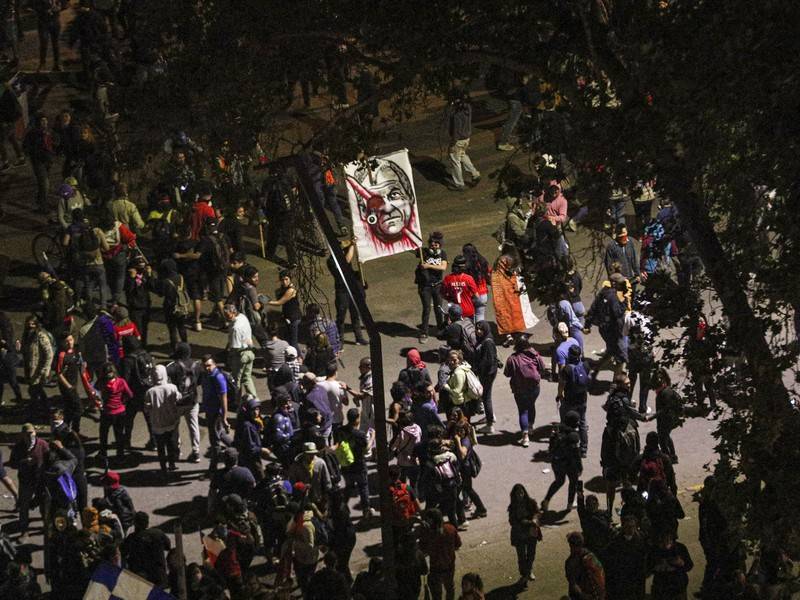 20 тысяч чилийцев вышли на Марш памяти погибших в массовых беспорядках - news.ru - Чили - Сантьяго