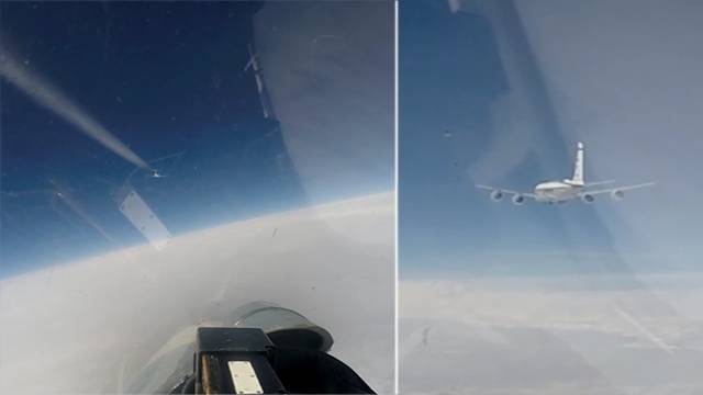 Су-27 не дал самолетам США и Швеции пересечь границу России над Балтикой - ren.tv - США - Швейцария