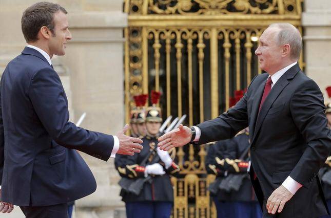 Владимир Путин - Эммануэль Макрон - Макрон назвал условие возвращения России в G8 - glavnoe.ua - Москва - Россия - Китай - Швейцария - Франция