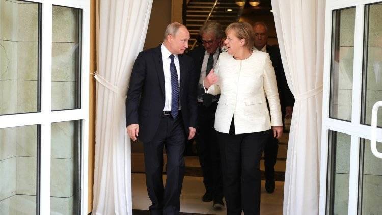Дональд Трамп - Владимир Путин - Ангела Меркель - Дмитрий Смирнов - Путин побеседовал с Меркель на саммите G20 - polit.info - Россия - США - Сирия - Украина - Германия - Япония - Венесуэла - Иран - Меркель