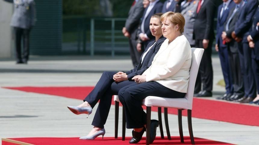 Владимир Путин - Ангела Меркель - Метте Фредериксен - Из-за дрожи Меркель слушала гимн сидя — видео - 5-tv.ru - Япония - Берлин - Дания