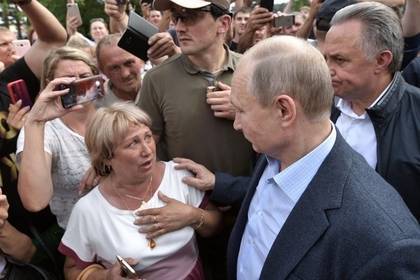 Владимир Путин - Визит Путина в затопленный Тулун скрыли от местных жителей - lenta.ru - Россия - Иркутская обл. - Иркутск - Тулун - Братск