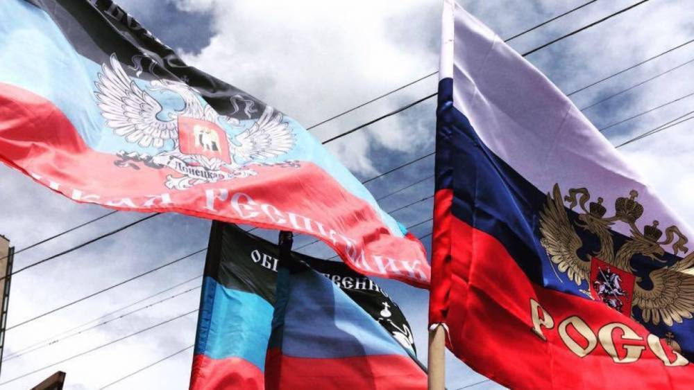 Александр Захарченко - Военкор оценил символичность российского флага над Донецком - riafan.ru - Россия - ДНР - Донецк