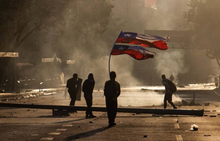 Экскурсии на массовые беспорядки продают в Чили - news.ru
