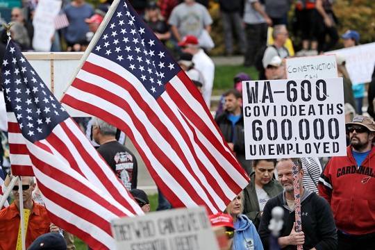 СМИ назвали организаторов акций против самоизоляции в США - versia.ru - США - Washington - шт. Миннесота - Washington