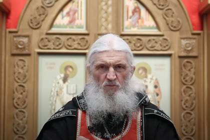 Николай Романов - Российский священник проклял сторонников закрытия храмов из-за коронавируса - lenta.ru - Биробиджан