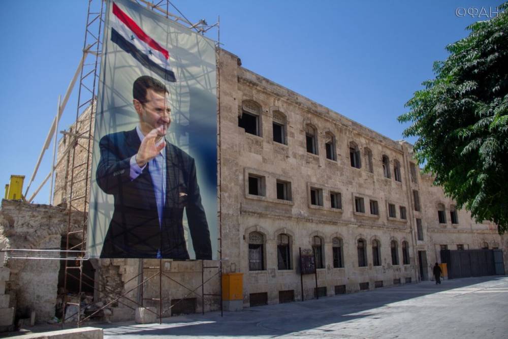 Андрей Кошкин - Асад защищает Сирию от коронавируса, улучшая условия жизни беженцев внутри страны - riafan.ru - Дамаск - Сирия - Сана