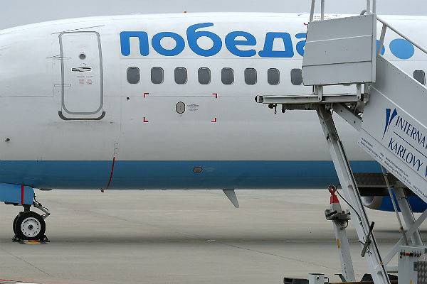 «Победа» нарядила самолет в медицинскую маску - trud.ru - Россия