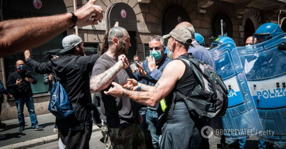 Джузеппе Конт - В Италии протестовали из-за коронакризиса: полиция применила слезоточивый газ. Фото и видео - obozrevatel.com - Италия