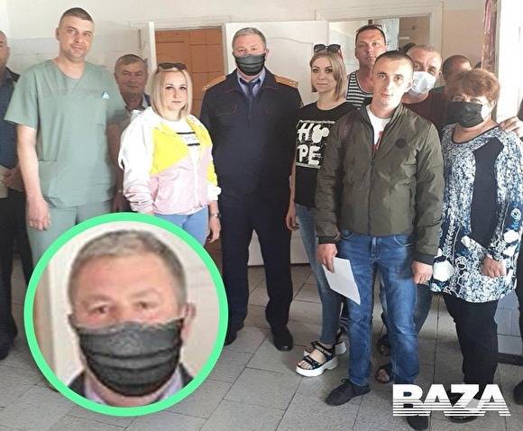 В Белгородской области следователю прифотошопили маску на снимке с медиками - znak.com - Белгородская обл. - Белгород