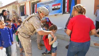 Российские военные доставили гуманитарную помощь жителям Латакии - tvc.ru - Сирия - Латакия