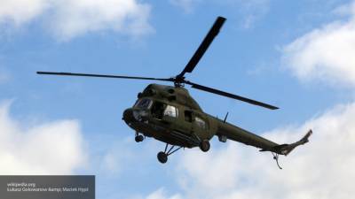 Спасатели нашли совершивший жесткую посадку вертолет Ми-2 в лесу в Якутии - inforeactor.ru - респ. Саха - Среднеколымск