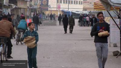 Сирийцы возвращаются в освобожденные от террористов города в Дейр-эз-Зоре - inforeactor.ru - Россия - Сирия - Сана