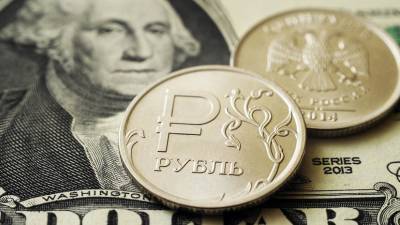 Лазарь Бадалов - Рубль растёт к доллару и евро - russian.rt.com - Россия
