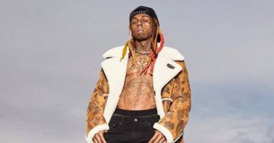 Рэпер Lil Wayne признал вину в незаконном хранении золотого пистолета - ren.tv - США
