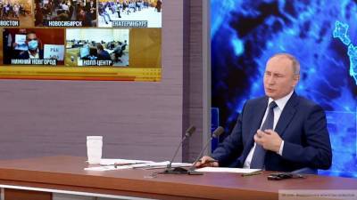 Владимир Путин - Путин рассказал, как россиянам помогают в период пандемии - riafan.ru - Москва