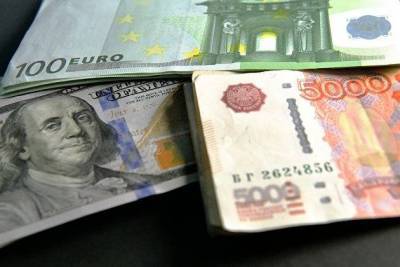 Рубль умеренно растет к доллару в начале дня - smartmoney.one - Москва