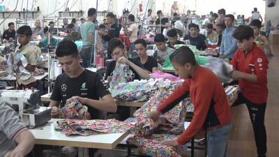 В Алеппо возобновила работу фабрика детской одежды - tvc.ru
