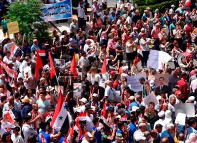Митинг в Хомсе: «Американские санкции работают против нас, а не правительства» - free-news.su - США - Сирия - Вашингтон - Сана - Хомс