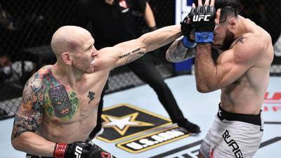 Александр Волков - Джош Эммет победил Шейна Бургоса на турнире UFC - iz.ru - Россия
