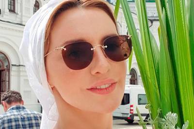 Владимир Путин - Виктор Медведчук - Оксана Марченко - Жена украинского оппозиционера назвала Путина «замечательным крестным» - lenta.ru - Россия - Украина