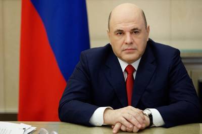 Михаил Мишустин - Мишустин подписал постановление о продлении доплат борющимся с COVID-19 соцработникам - pnp.ru - Россия