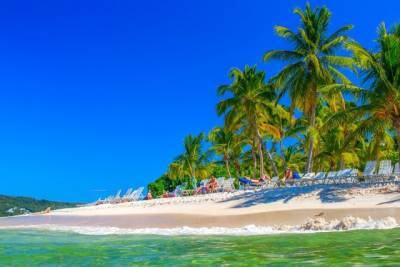 Российские туристы смогут посетить Доминикану в этом году без ограничений - aif.ru - США - Швейцария - Доминикана
