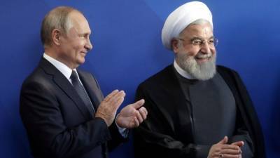 Владимир Путин - Хасан Рухани - Глава Ирана поблагодарил Путина за последовательную позицию по сохранению ядерной сделки - 5-tv.ru - Россия - Сирия - Иран