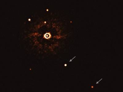 Астрономы впервые сфотографировали планетную систему у солнцеподобной звезды - polit.ru