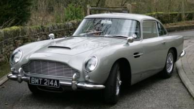 Джеймс Бонд - Aston Martin - Шон Коннери - Новый Aston Martin DB5 получит муляж пулемёта и пуленепробиваемое лобовое стекло - usedcars.ru