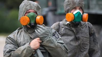 Российские военные приступили к дезинфекции автобусов в Алеппо - iz.ru - Сирия - провинция Алеппо