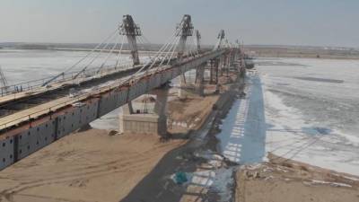 Михаил Мишустин - Мишустин оценил строительство моста через Амур между Россией и Китаем - piter.tv - Россия - Китай
