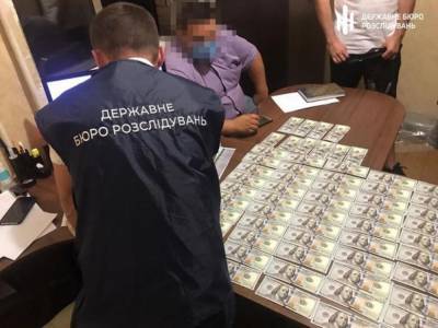 Сотрудников полиции задержали за взятку для прекращения уголовного дела - golos.ua - Киевская обл.
