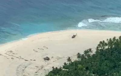 В Тихом океане спасли людей благодаря надписи SOS на песке - korrespondent.net - США - Микронезия - Острова