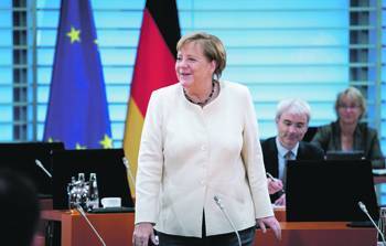 Ангела Меркель - Тэги Моисеев - Берлин заталкивает беженцев в ЕС - ng.ru - Франция - Берлин - Ес