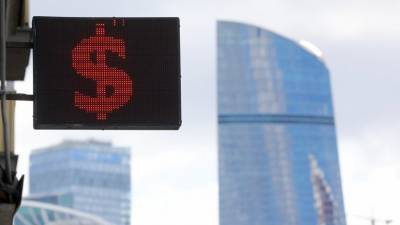 Владислав Гинько - Экономист прокомментировал рост доллара в ходе торгов до 79 рублей - russian.rt.com - Россия - США