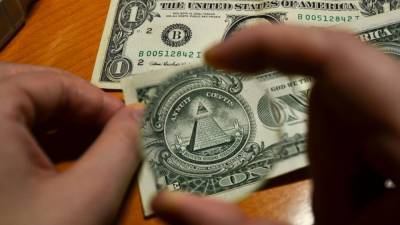 Доллар взлетел выше 75 рублей впервые с 11 января - riafan.ru - Москва - США