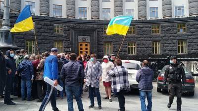 Владимир Зеленский - Украинцы массово выходят на митинги против роста коммунальных тарифов - riafan.ru - Киев - Одесса - Днепропетровская обл.