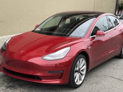 Илоном Маский - Tesla впервые зафиксировала годовую прибыль - rosbalt.ru - США