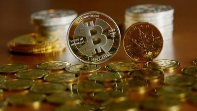 Эксперт оценил способность биткоина вытеснить золото на инвестиционном рынке - russian.rt.com