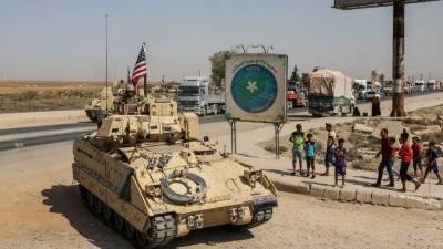 США перебросили из Ирака в Сирию колонну грузовиков с оружием и техникой - riafan.ru - США - Сирия - Ирак - Эль-Камышлы