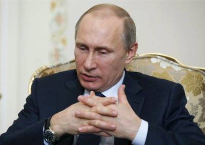 Владимир Путин - Путин поручил подумать над повышением до 10% ВВП порога ФНБ, позволяющего тратить излишки резервов - smartmoney.one - Москва - Россия - Reuters