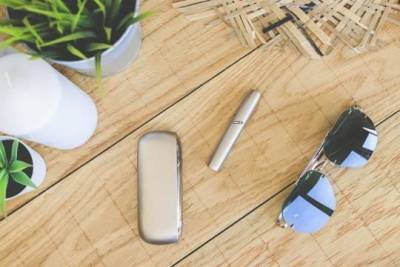 На территории США запретили продавать IQOS - versia.ru - США - Англия