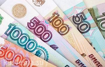 Юрий Попов - Российский рубль упал до недельного минимума на фоне распродажи госдолга - charter97.org - США - Белоруссия - Минск