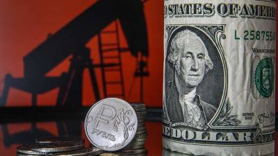Дмитрий Маринченко - Fitch оценил прибыль России от роста цен на нефть и газ в $50 млрд - iz.ru - Россия - Израиль