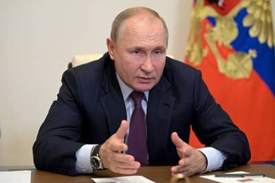 Владимир Путин - Путин назвал ошибкой давление США при помощи доллара - lenta.ru - Россия - США