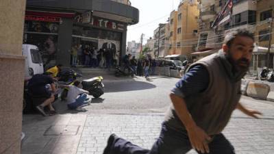 Паника в столице Ливана: неизвестные обстреляли демонстрацию сторонников Хизбаллы - vesty.co.il - Израиль - Ливан - Бейрут
