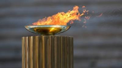 В Китае встретили Олимпийский огонь зимних Игр 2022 года - 5-tv.ru - Китай - Пекин - Греция