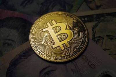 Биткоин побил исторический рекорд - lenta.ru - США